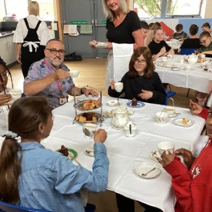 Pupils having afternoon tea